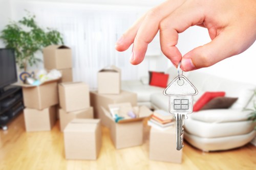 Loading boxes and furniture into a van in Chingford
