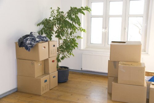 Packed moving boxes and furniture for a home relocation