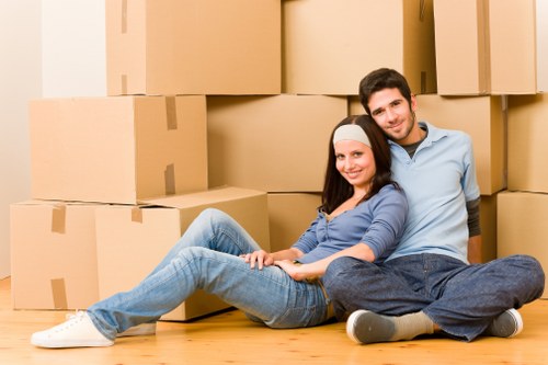 Loading boxes and household items into a van for a Chingford move