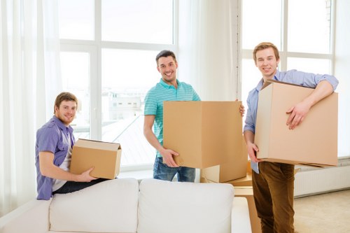 Moving day preparation with boxes and furniture in a Chingford property