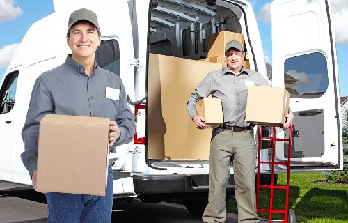 Commercial office move preparation with desks and IT equipment